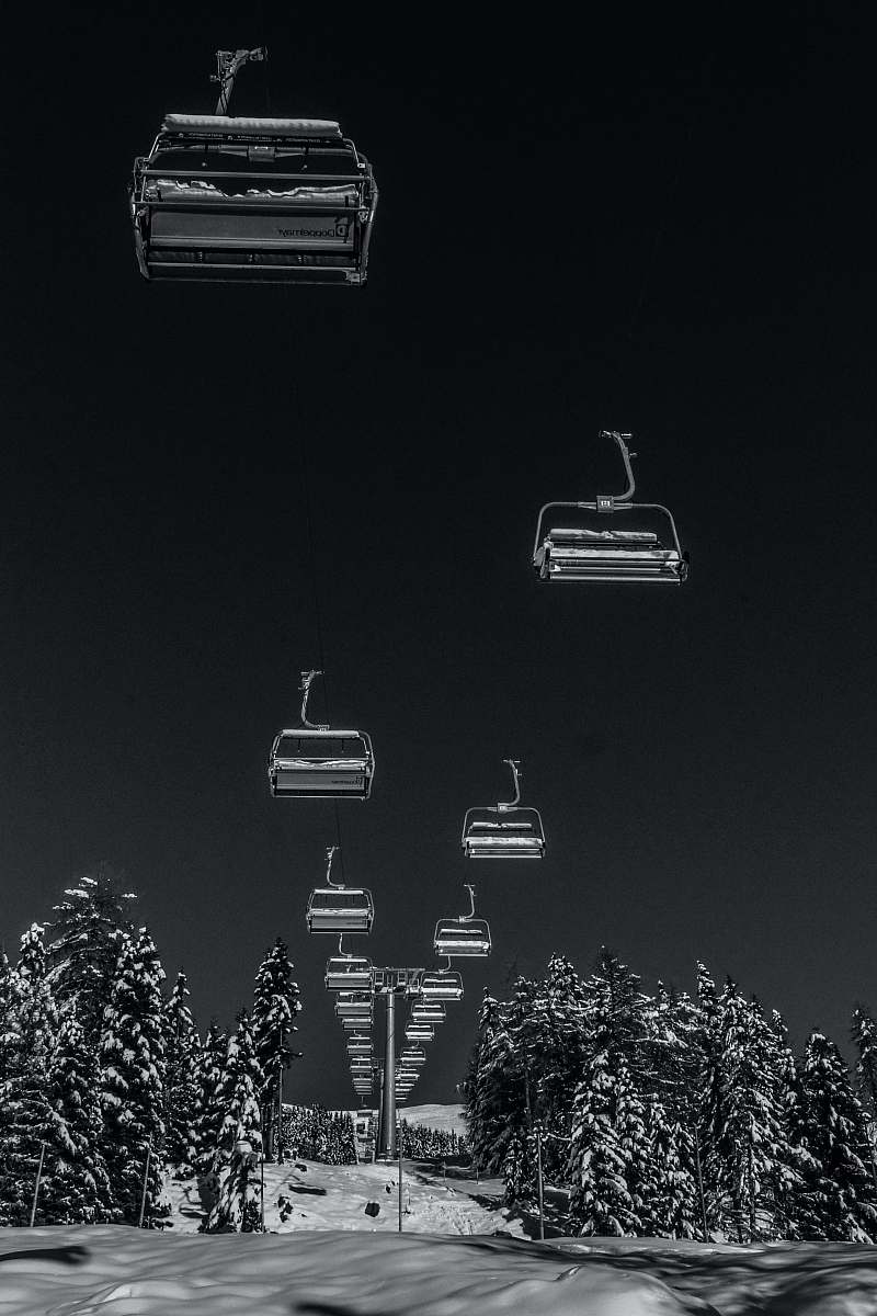 black-and-white gray scale photo of cable cars harmonica